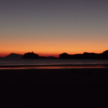 Mountain range in front of a red sunrise Mountain range in front of a red sunrise
